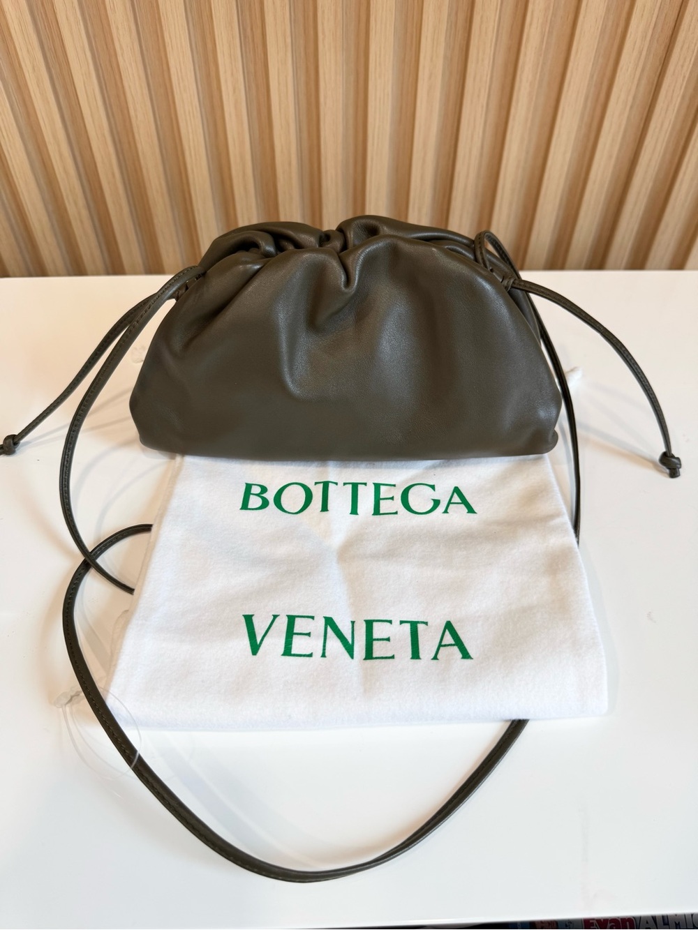 BOTTEGA VENETA Butter Calfskin The Mini Pouch in Green Kaki Fondente